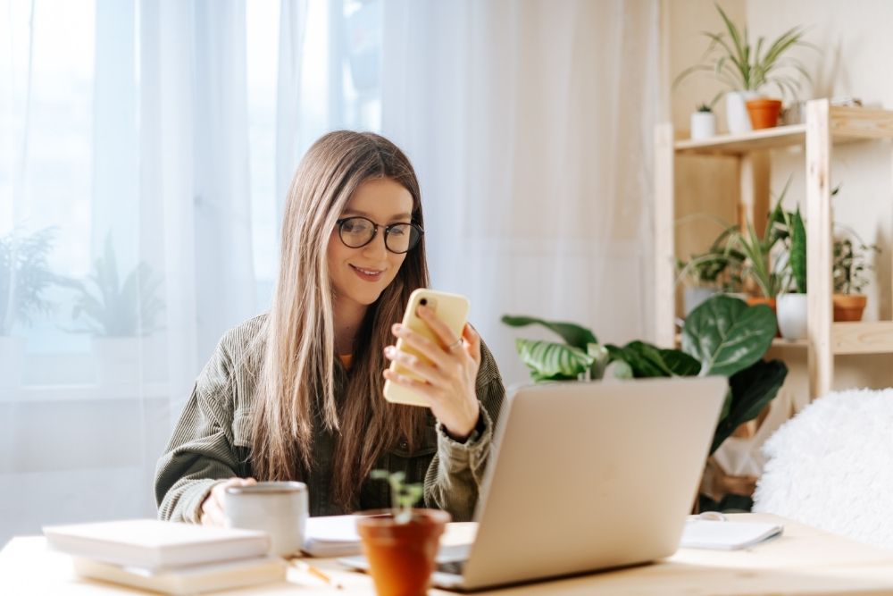 Web designer helping local business owner build a mobile-first, responsive website.