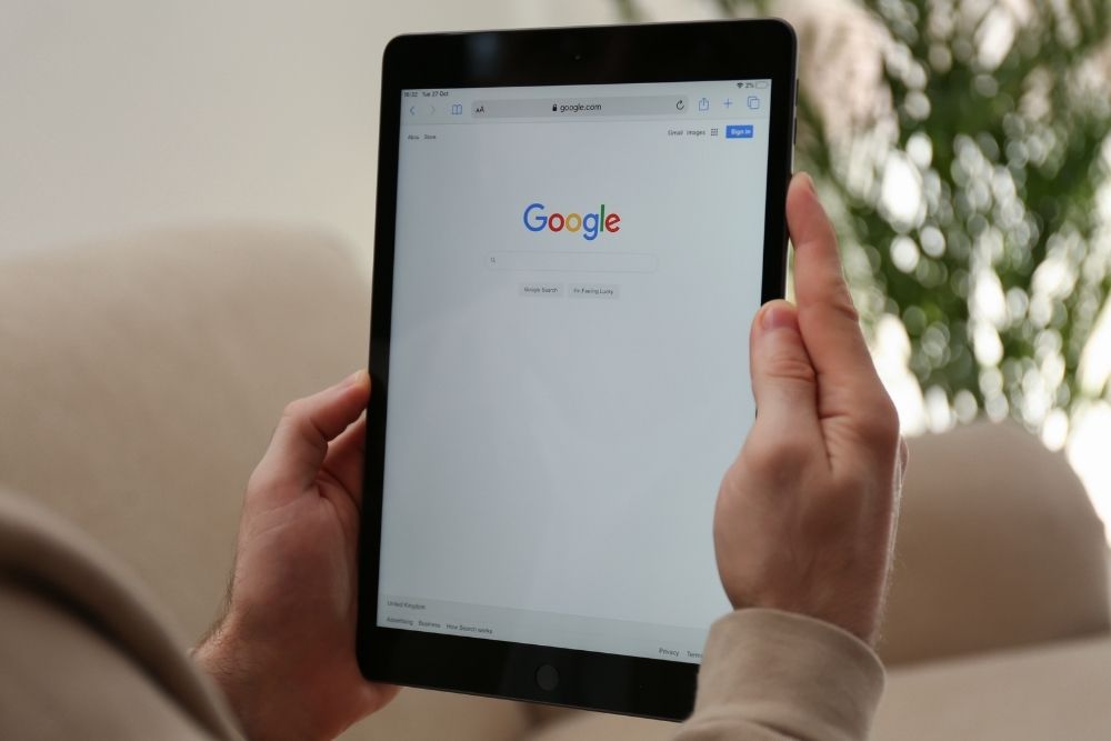 A tablet displaying a  Google search interface.